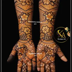 A full-arm floral mehendi with a modern twist. The design incorporates geometric chevron patterns on the arms, which contrast beautifully with the soft, shaded flowers on the hands.