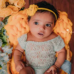 That look of wonder is just everything. At three months old, babies are so curious about the world, and I love capturing that in my photos.