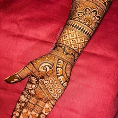 This stunning ring ceremony design is filled with beloved traditional symbols. I combined floral patterns with peacock and elephant motifs to create a rich, celebratory look perfect for an engagement.