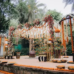 A breathtaking floral mandap with a mix of traditional marigolds and modern floral arrangements, creating a unique and beautiful ceremony space.