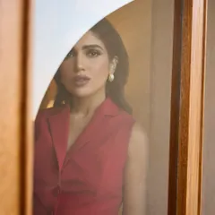 Painting the town red with Bhumi Pednekar in this Rohit Gandhi and Rahul Khanna pantsuit. This look is the definition of power dressing, with its sharp tailoring and bold color making a strong statement.