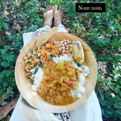 A simple, nourishing meal of rice, vegetables, and legumes served on a leaf plate at the Isha Yoga Center. Eating in this way, close to nature, makes you more sensitive to the food you consume and how it affects your system. It is a practice in mindfulness itself.