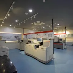 An experience center designed to showcase technical equipment. The layout and lighting are carefully planned to highlight the products and facilitate demonstrations.