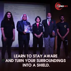 During a presentation, we discuss the importance of situational awareness. Our corporate training goes beyond physical moves to teach employees how to identify potential threats and use their environment as a tool for protection.