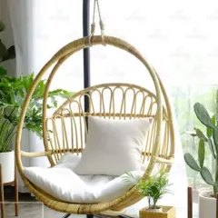 Create your own cozy corner with our handwoven rattan swing chair. Suspended from a sturdy rope, it’s the perfect addition to a balcony, garden, or a sunlit reading nook, offering a gentle sway and a touch of bohemian elegance.