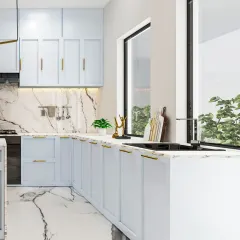 The L-shaped layout of this kitchen maximizes counter space and workflow efficiency. We used book-matched marble for the floor and backsplash to create a seamless, luxurious feel.