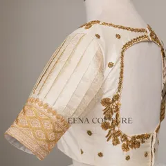 This video showcases an ivory-toned blouse with pleated puff sleeves and gold embroidery. It highlights the intricate handwork and traditional materials that go into every piece I create for my brides.