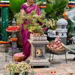 A beautiful arrangement for Makar Sankranti at our store, featuring a Tulasi Katte, a stone chariot, and offerings of the harvest.