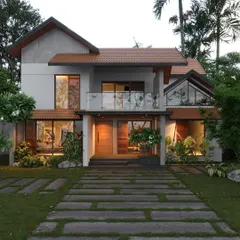 A prime example of my tropical fusion style, this home combines traditional sloped terracotta roofs with modern, large-format glass windows. The design ensures the home feels both contemporary and deeply rooted in Kerala's architectural heritage.