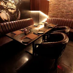 This seating nook at Harmony Inn demonstrates the use of subtle, integrated lighting to enhance the architectural details and create a comfortable, well-lit space for guests.