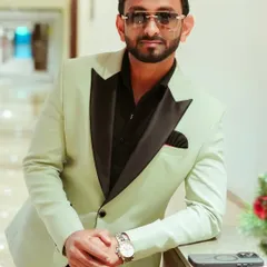 A closer look at the details of my formal wear. A well-fitted suit and the right accessories are essential for any professional event host.