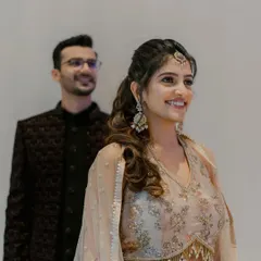 A beautiful shot of the happy couple. Her makeup is fresh and radiant, perfect for a night of dancing and celebration.