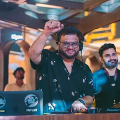 Me and the saxophonist hyping up the crowd at the Biergarten Bellandur launch. The Ashvij Experience in full effect.