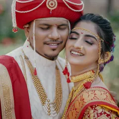 The quiet moments are often the most powerful. This close-up of a Maharashtrian couple captures the deep connection and 'sukoon' shared between them, highlighting the beautiful details of their traditional wedding attire.
