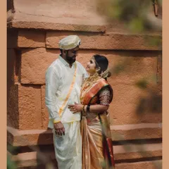 A quiet look of love shared against the warm tones of a heritage wall. These are the unposed, heartfelt moments I aim to capture, reflecting your genuine connection.