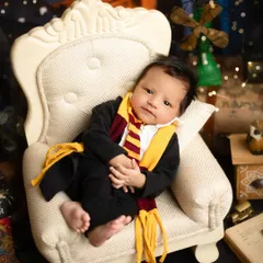 Awake and ready for a magical adventure. This alert moment during our Harry Potter session shows that we capture both sleepy and expressive portraits.