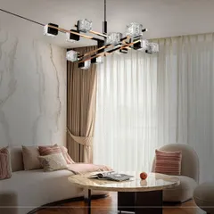For this contemporary living room, I selected a sculptural chandelier with multiple light sources. Its unique form adds an artistic touch while providing ample, distributed light for the entire seating area.