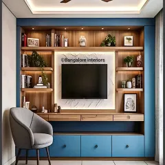 This entertainment unit combines a TV panel with extensive bookshelves and a built-in desk. The blue accent color and backlighting create a vibrant and multi-functional living room wall.