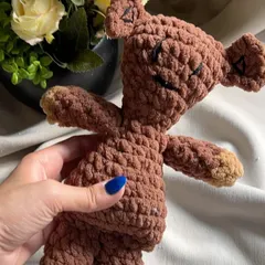 A close-up of our Mr. Bean's Teddy, showing the texture of the chunky yarn. This plushie is designed to be a durable, huggable friend, perfect for bringing a bit of classic comedy and warmth into your home.