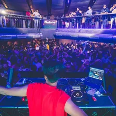 My view from the DJ booth at a packed club. I thrive on the energy of the crowd, mixing tracks that keep the dance floor full and the vibe electric all night long.