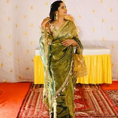 It brings me so much joy to see my clients styling my pieces. Here, a beautiful client pairs a shimmering olive green saree with one of my golden potli bags, creating a stunning look for a wedding function.