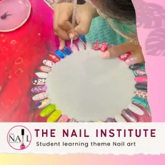 Students learn to create themed nail art, practicing different designs on a color wheel to build their portfolio of styles.