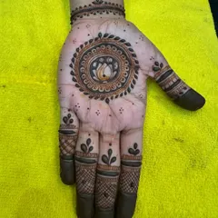 A simple yet elegant mandala design with a lotus at its center. Perfect for someone who wants a minimalist but beautiful look.