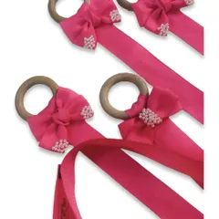 A collection of our hair accessory organizers, ready to be shipped. The wooden ring and bright pink ribbon make it a beautiful piece of decor for a kid's room.