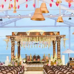 Your wedding ceremony, set against the sea. For this destination wedding in Phú Quốc, Vietnam, we designed and built a beachfront mandap that felt both traditional and open to the coastal air. We handle all logistics, so you can have your dream wedding anywhere in the world.