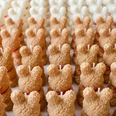 A close-up of the Rose Bear candles from a baby shower bulk order, showing the texture before the finishing touches.