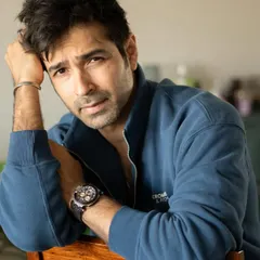This portrait of actor Varun Mitra was captured using the soft, natural light from a large window in his home. This setting creates an honest and relaxed feel, perfect for an actor's portfolio.