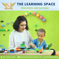 Welcome to The Lego Space! Here, a child is deeply focused on building, demonstrating how block play develops concentration, spatial awareness, and problem-solving skills.