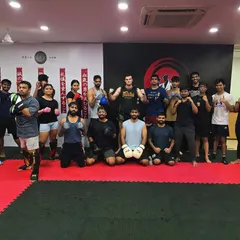 Starting the weekend with a bang. The energy is high as our members gather for a group photo after a rewarding Saturday session.