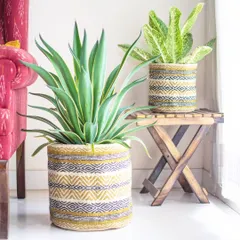 Let your plants be a statement. Our African-inspired jute baskets serve as gorgeous floor planters, bringing texture, pattern, and a touch of global design to any corner of your home.