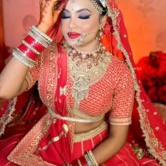 Capturing the perfect bridal portrait is part of the job. This look features a classic red lip and winged liner, a go-to combination for North Indian brides that you will learn to perfect.