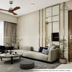 This view highlights the use of a large, sectioned mirror to create an illusion of space and reflect light. The L-shaped sofa provides ample seating, making this living room perfect for both relaxing and entertaining.