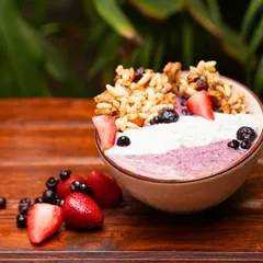 Start your day with vibrant energy. My Berry Smoothie Bowl is packed with antioxidants and topped with fresh berries and crunchy granola for a wholesome, delicious boost.