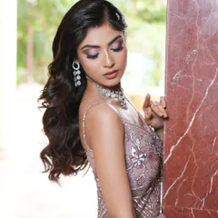 This enchanting look was all about soft, dreamy glamour. I used shades of lilac and pink on the eyes to create a watercolor effect, paired with luminous skin. This style is perfect for festive campaigns or brands that want to convey a sense of romance and elegance.