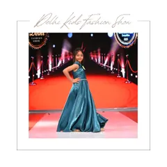 This young model commands the stage in a gorgeous teal satin gown. My runway photography focuses on capturing powerful poses and the flow of the fabric, creating standout images for a professional kid's portfolio.