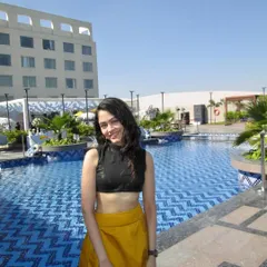 Enjoying a sunny day by the pool, likely before or after a gig. Traveling for performances is one of the best parts of my job.