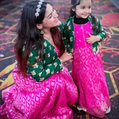Another look at our twinning outfits. Creating these matching mother-daughter dresses was a special project that gave a forgotten saree a beautiful new purpose.
