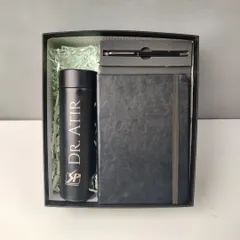 This all-black corporate hamper is a classic. It contains a temperature-display bottle, a diary, and a metal pen, all customized and presented in a matching gift box.