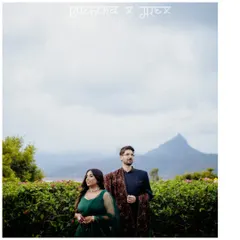 A stunning portrait of Ruchika and Alex. The majestic mountain backdrop in Lonavala provides a breathtaking setting for this simple yet powerful image, showcasing their connection.