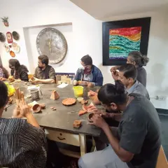 A corporate group from the India Foundation for the Arts (IFA) gets hands-on with clay during our "Monster Morning" workshop. It's always a joy to see professionals embrace their playful side.