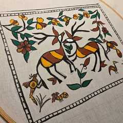 This fabric painting is inspired by the traditional Sohrai folk art style. Our workshops explore various regional art forms, teaching you how to adapt their unique motifs onto different surfaces like cloth.
