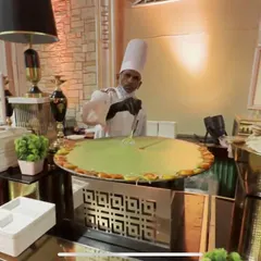 This is my live 'Tamatar ki Chaat' station in action. Guests love the theatre of watching our chefs prepare this tangy and savoury street food classic right before their eyes, served hot and fresh.