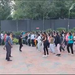 A wide shot of the outdoor session at Atria IT. I can adapt to any space, whether it's a boardroom, a ballroom, or an open campus courtyard, to deliver an effective team engagement activity.