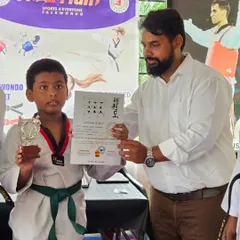 We recognize excellence. Rashid is awarded the 'Best Fighter' trophy at our 2024 belt promotion exam for his outstanding performance.