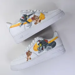 A throwback to the classics with this Tom and Jerry custom on a Nike Air Force 1. I designed the Nike swoosh to look like a slice of cheese, bringing the whole cat-and-mouse chase to life right on the sneaker.
