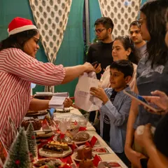 This is my favorite part of any pop-up: connecting with our wonderful community. Sharing a smile and a treat with a young guest at our Christmas stall makes all the hard work worth it.